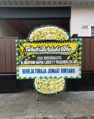 Papan Bunga Duka di Dwikora